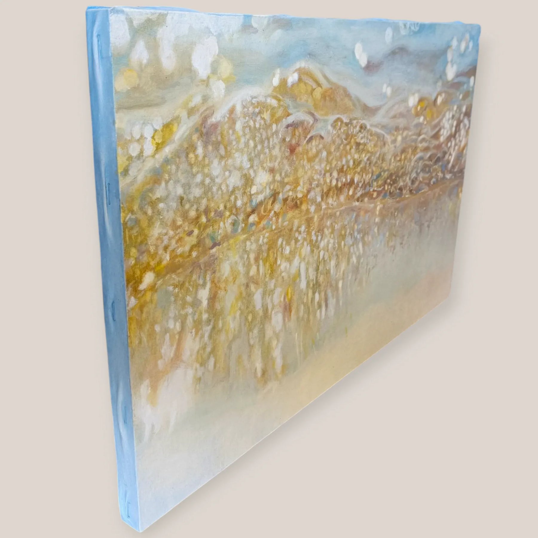 “Blue_Shadows,Golden_Droplets”